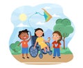 Young girl in a wheelchair playing with friends