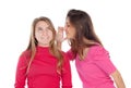 Young girl whispering a secret to her sister Royalty Free Stock Photo