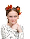 Young girl in white blous and beautiful flowers in her hair. Royalty Free Stock Photo