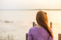 young girl on a wooden bridge Royalty Free Stock Photo