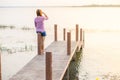 young girl on a wooden bridge