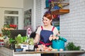 Young girl working in a flower shop Royalty Free Stock Photo