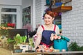 Young girl working in a flower shop Royalty Free Stock Photo