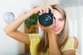 Young girl working with photocamera Royalty Free Stock Photo