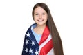 Young girl wrapped in american flag Royalty Free Stock Photo