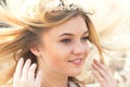 Young girl in a wreath of flowers with apricot Royalty Free Stock Photo