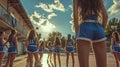Young girls in blue uniform, basketball players standing outdoors on warm summer day before training Royalty Free Stock Photo