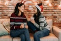 Young girls chatting in the living room