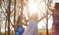 Young girls children kids playing running in fallen autumn leave Royalty Free Stock Photo