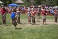 Young girls compete in Three Legged race Royalty Free Stock Photo