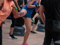 Young Girls doing Fitness and Boxing Workout with Black Punching Bag