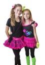 Young girls dressed in retro 80s clothing isolated on a white background Royalty Free Stock Photo