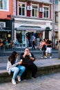 Young Girls eating Ice Cream in a Sunny Day