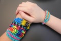 Young girls' fashion accessories: loom band bracelets Royalty Free Stock Photo