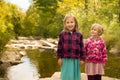 Young Girls - Holding Hands by River Royalty Free Stock Photo