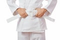Young girls judo fighters isolated in white kimono