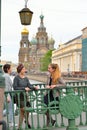 Young girls laughing on the Italian bridge across the Griboyedov Royalty Free Stock Photo