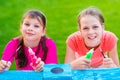 Young Girls Painting Cardboard House Royalty Free Stock Photo