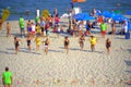 Young girls racing on summer beach