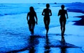 Young Girls Running on Beach