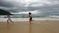 Girls playing on beach, Da Nang, Vietnam Royalty Free Stock Photo