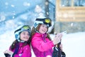 Young girls are taking selfie on a ski slope Royalty Free Stock Photo