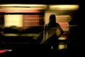 Young girls and traffic in blurry abstract city motion