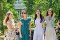 Young girls on a walk in the city park