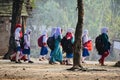 Young girls are walking together to attend the village school