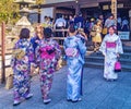 Young girls wearing Japanese kimono standing in front of Kiyomizu-dera Temple in Kyoto, Japan Royalty Free Stock Photo