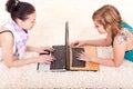 Young girls working on laptops Royalty Free Stock Photo