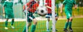 Young Goalkeeper Saves. Football Horizontal Background