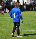 Young goalkeeper at the soccer field