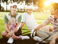 Young Golfers relaxing in vintage golf attire Royalty Free Stock Photo