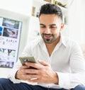 Young good looking man at home Royalty Free Stock Photo