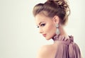 Young gorgeous girl dressed in evening gown and delicate makeup on. Royalty Free Stock Photo