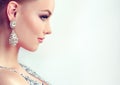 Young gorgeous girl dressed in evening gown and delicate makeup on. Royalty Free Stock Photo