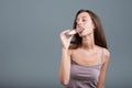 Young gorgeous woman eating ice cream Royalty Free Stock Photo