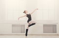 Beautiful ballerina stands in ballet pirouette