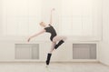 Beautiful ballerina stands in ballet pirouette