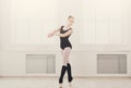 Beautiful ballerina stands in ballet pirouette