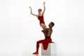 Young graceful couple of ballet dancers dancing on white studio background Royalty Free Stock Photo