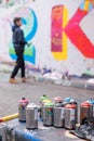 Young graffiti artist at work blurred, Leake Street tunnel. Waterloo, London UK. Royalty Free Stock Photo