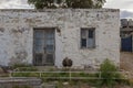 Young greater rhea in front of an old house in Patagonia, Argentina Royalty Free Stock Photo