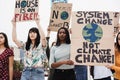 Young group of demonstrators on road from different culture and race fight for climate change - Focus on african woman