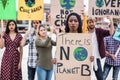 Young group of demonstrators on road from different culture and race fight for climate change - Focus on african woman