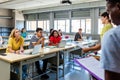 Young group of diverse high school students giving a presentation in classroom Royalty Free Stock Photo