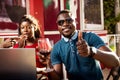 Young group of friends drinking a glass of red wine Royalty Free Stock Photo