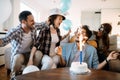 Young group of happy friends celebrating birthday Royalty Free Stock Photo