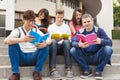 young group of students study together